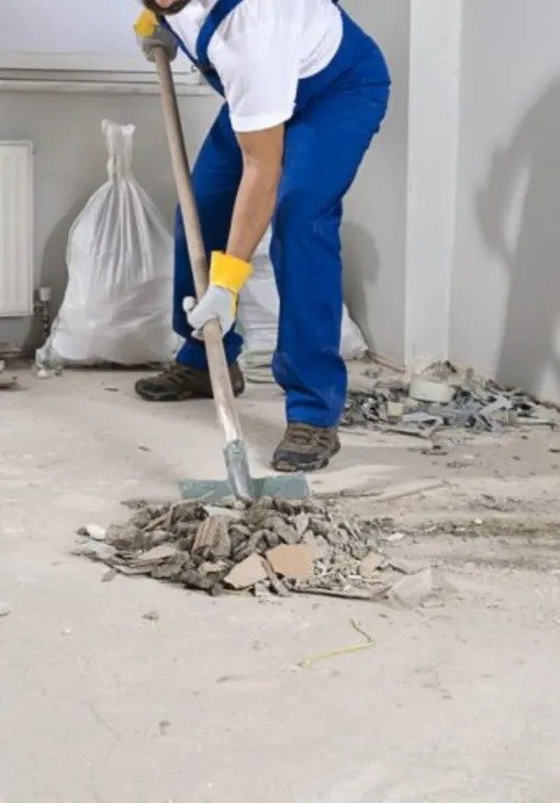 Cleanup crew removing construction waste safely